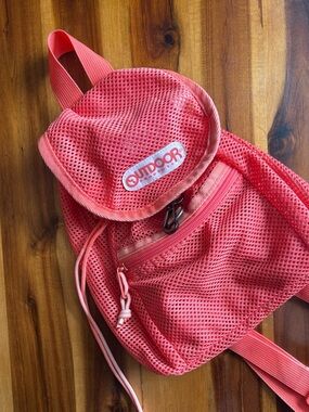 OUTDOOR PRODUCTS Boardwalk Mini Mesh Backpack in Coral / AS-IS